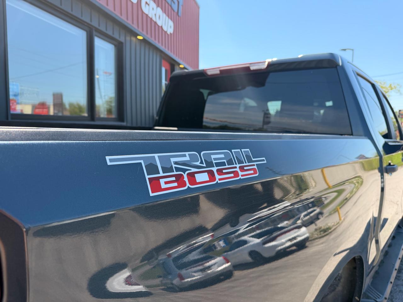 2019 Chevrolet Silverado 1500 Pickup Truck Black side bed badging close-up showing TrailBoss nameplate detail.