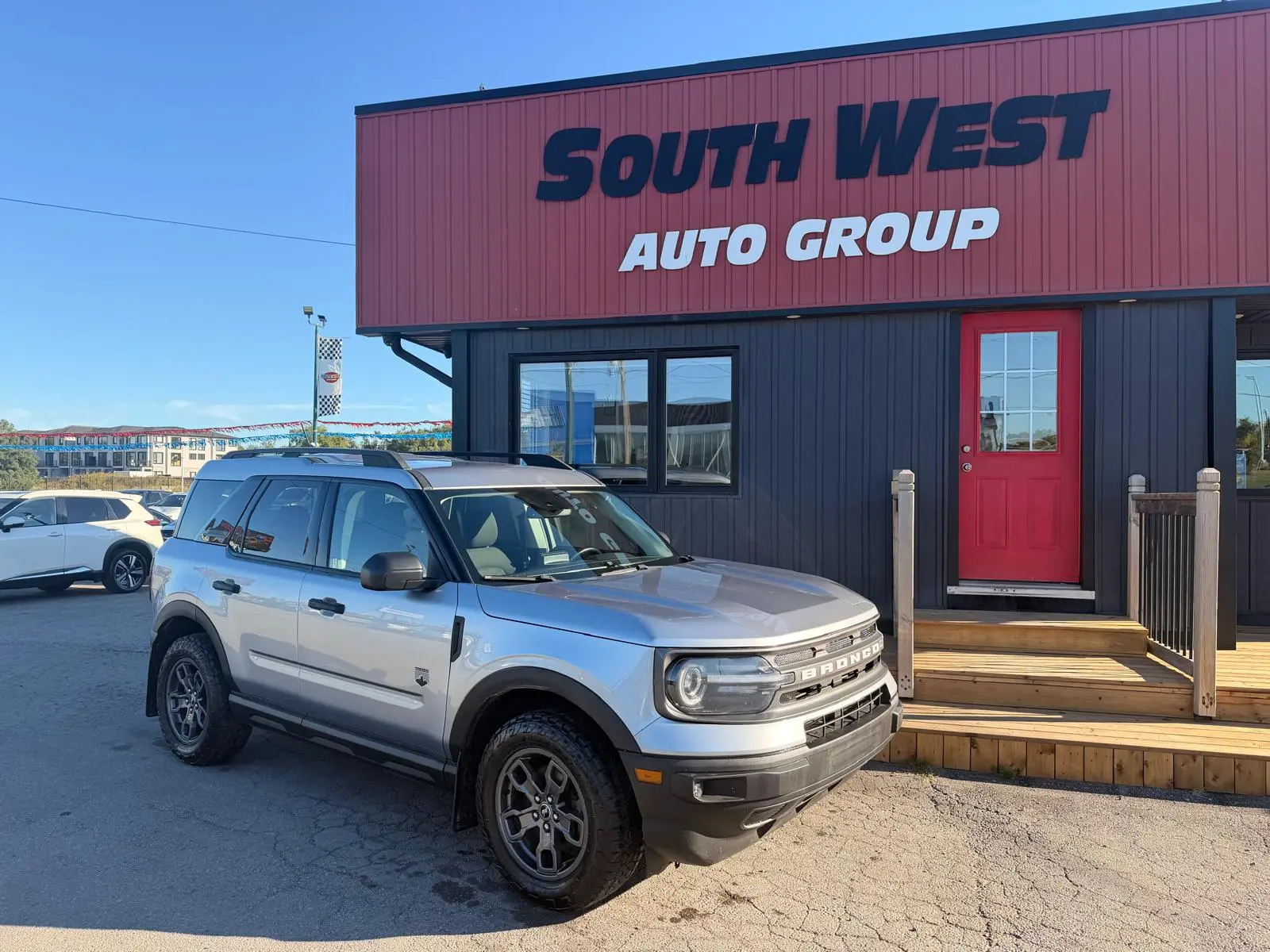 2021 Ford Bronco Sport Big Bend Silver front three-quarter exterior view parked at dealership with alloy wheels visible.